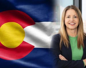 Dr. Marielena DeSanctis on the left. Colorado flag on the right.