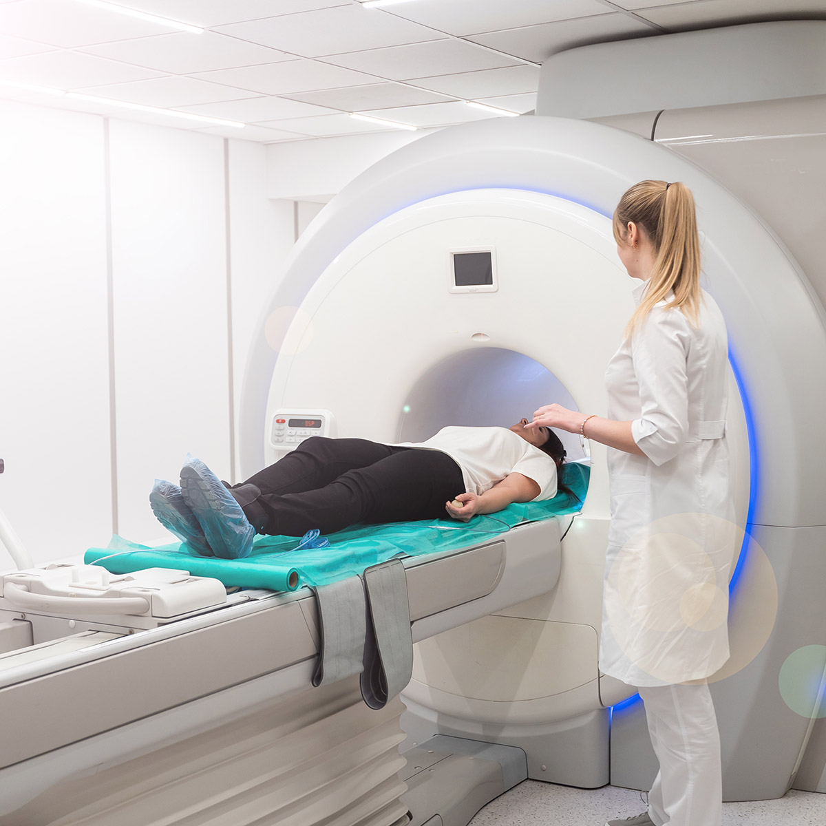 CCD Computed Tomography student performing an MRI on a patient