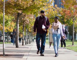students walking across CCD campus