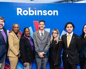 Community College of Denver staff and students wearing suits.