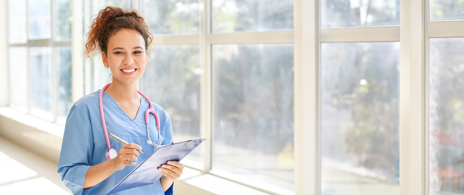 female CCD Practical Nursing student in scrubs